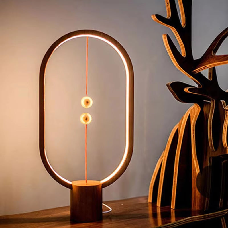 Creative LED Mini Balance Table Lamp - USB Night Light for Bedroom Decor.